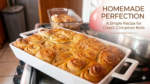 Freshly baked cinnamon rolls in a white rectangular casserole dish, with a secondary glass dish in the background.